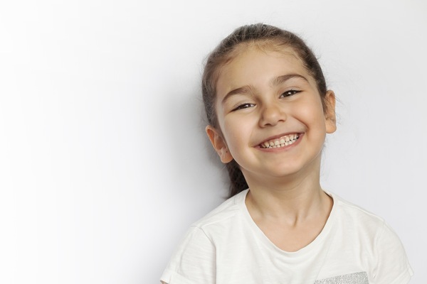 Healthy Smiles for Growing Kids: Dental Tips for Children and Teens